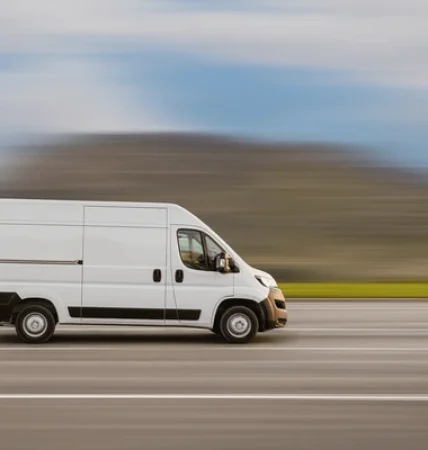 cargo-van-driving-on-highway-600nw-2476921679